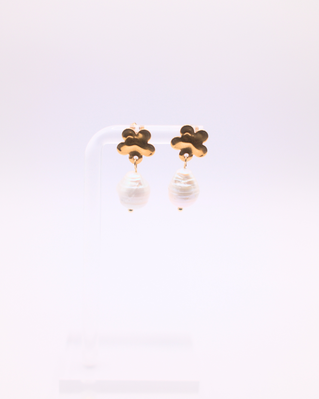 Pearls on flower stud earrings