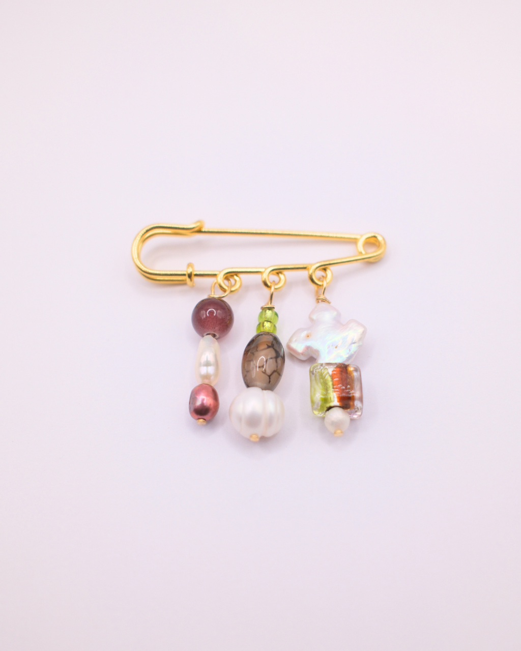 Brown, green and pearl beaded gold safety pin brooch